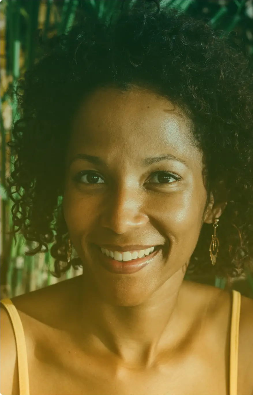 Smiling woman feeling confident and happy.